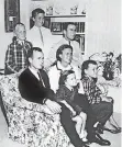  ?? [AP FILE PHOTO] ?? In this 1964 photo, George H.W. Bush sits on a couch with his wife, Barbara, and their children. George W. Bush sits at right behind his mother. Behind the couch are Neil and Jeb Bush. Sitting with their parents are Dorothy and Marvin Bush. Former...