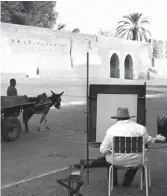  ??  ?? Donkey work: Winston Churchill painting on holiday in Marrakech (1959)