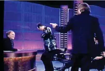  ??  ?? Walkout: The riled Bee Gees storm out of a 1997 interview with chatshow host Clive Anderson