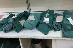  ??  ?? A doctor tweeted that the bodies of the seven babies were wrapped up in green cloth.