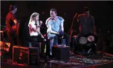  ?? —AFP ?? In this file photo Shakira and Chris Martin from Coldplay perform together on stage during the Global Citizen Festival G20 benefit concert at the Barclaycar­d Arena in Hamburg.