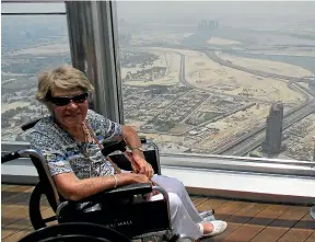  ??  ?? Being in a wheelchair didn’t stop Francie getting to the world’s tallest building, the Burj Khalifa in Dubai.