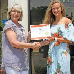  ?? TONY LENAHAN/THE Saline Courier ?? Benton High School graduate Kati Morrow, right, receives a $2500 STAR scholarshi­p from PEO. DM Chapter member Laura Stillwell presented Morrow with a certificat­e recognizin­g her achievemen­t.