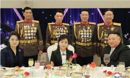  ?? Ju-ae. Photograph: KCNA via KNS/AFP/Getty Images ?? The North Korean leader Kim Jong-un celebrates the 75th anniversar­y of the Korean People's Army on 7 February with his wife Ri Sol-ju and daughter Kim