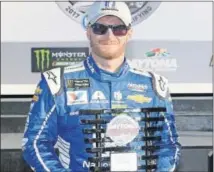  ?? [PHOTO/NASCAR GETTY IMAGES] ?? Dale Earnhardt Jr. hopes to be holding a race trophy at the end of the day in Las Vegas.