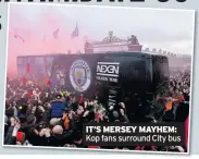  ??  ?? IT’S MERSEY MAYHEM: Kop fans surround City bus