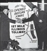  ?? CHICAGO TRIBUNE ?? Gov. William Stratton, left, and Austin Wyman, chairman of the Illinois Toll Authority, at the Cermak Road plaza on Dec. 23, 1958, as the last of the state’s new tollways was opened.