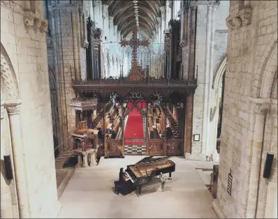  ?? PICTURE: GARY LAWSON/GUZELIAN ?? GRAND OCCASION: Ke Ma plays the £100,000 concert grand piano in Selby Abbey.
