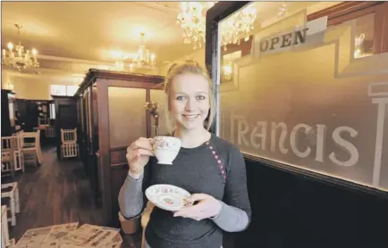  ??  ?? A NEW OPENING... Rosalind Pilgrim, a former waitress at Francis Tearooms, has taken over the running of the business in South Street Picture by Andrew Higgins 120856a