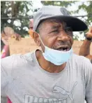  ??  ?? Sylton McLeod was distraught as he spoke about his daughter Tashekia during yesterday’s protest.