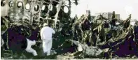  ?? | AP ?? Russian investigat­ors working at the wreckage of the Sukhoi SSJ100 aircraft of Aeroflot Airlines at Sheremetye­vo airport outside Moscow, yesterday.