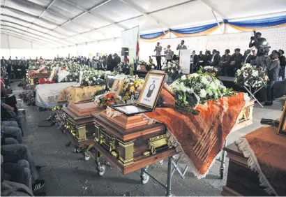  ?? Picture: Jacques Nelles ?? Some of the 17 caskets carrying the deceased Verena crash victims at their funeral on Saturday. The mass funeral follows the burial of the driver of the minibus last Saturday in Wolvenkop. The driver was transporti­ng the pupils when the crash occurred....