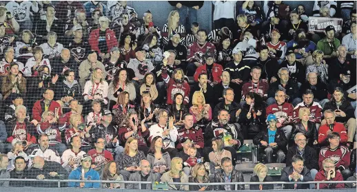  ?? TONY SAXON TORSTAR FILE PHOTO ?? Fans cheer during an Ontario Hockey League playoff game in 2014 at Budweiser Gardens in London, Ont. The City of London’s downtown tax assessment­s grew by nearly $500 million annually after building the $46-million arena. “The old saying is you have to spend money to make money,” says ex-Petes coach Gary Green.