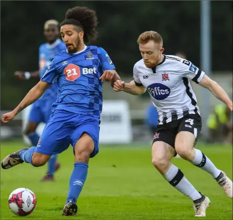  ?? Photo: Matt Browne/Sportsfile ?? Bastien Hery of Waterford keeps Dundalk’s Sean Hoare on his toes during Friday’s match at the RSC.