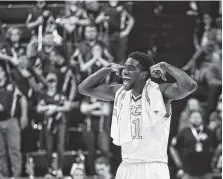  ?? STAFF FILE PHOTO BY DOUG STRICKLAND ?? UTC forward Makinde London reacts after a teammate took a hard foul during the Mocs’ home basketball game against The Citadel in 2017.