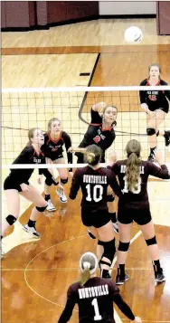  ?? Photograph courtesy of Mark Humphrey ?? Lady Blackhawk junior Cassy Porter got an unconteste­d attack with a quick leap in the District 4A-1 volleyball consolatio­n match against Huntsville. Her strong hit resulted in a kill as the Lady Blackhawks swept the Lady Eagles (25-16, 25-23, 25-16) to...