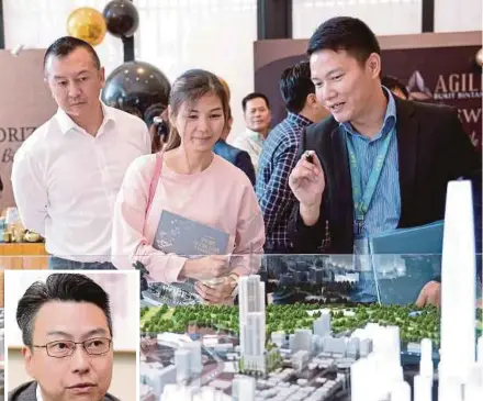  ?? PIC BY KHAIRUL AZHAR AHMAD ?? People looking at a miniature model of the Agile Bukit Bintang project in Kuala Lumpur yesterday.
(Inset) Chai Keng Wai