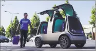  ?? Associated Press ?? Nuro and grocery chain Kroger are teaming up to bring unmanned delivery service to customers. The companies said Tuesday that Nuro’s unmanned vehicle, the R1, will be added to a fleet of autonomous Prius vehicles that have run self-driving grocery delivery service in Scottsdale, Ariz.