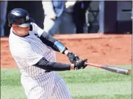  ?? Sarah Stier / Getty Images ?? The Yankees’ Gary Sanchez hits a home run during the fourth inning against the Toronto Blue Jays at Yankee Stadium on Saturday.