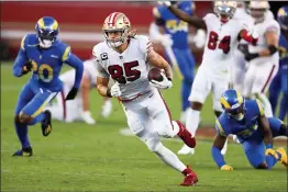  ?? RANDY VAZQUEZ — BAY AREA NEWS GROUP, FILE ?? The 49ers’ George Kittle (85) runs for a touchdown past the Rams defense during the second quarter at Levi’s Stadium in Santa Clara on Oct. 18.