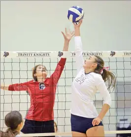  ?? Dan Watson/The Signal (See additional photos on signalscv.com) ?? In this Signal file photo, Santa Clarita Christian’s Julia Phillipps (6) goes up to block a shot by Trinity Classical Academy’s Jessica Eblin (24). Eblin was named All-CIF on Monday.