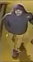  ?? PHOTO ?? This image taken from a Feb. 24, 2015 surveillan­ce video and provided Saturday by the New York City Police Department, shows a man being sought by the NYPD in connection with a rape three years ago. New York detectives are again asking for help in...