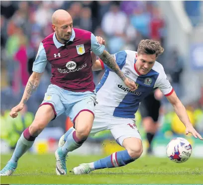  ?? Alex Livesey ?? Alan Hutton of Aston Villa and Sam Gallagher of Blackburn Rovers battle for the ball