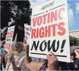  ?? CHUCK BURTON, AP ?? The Supreme Court will not reconsider a lower court’s ruling on North Carolina’s voting rights, the subject of demonstrat­ions in 2015, such as this one in WinstonSal­em.