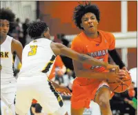  ?? Caroline Brehman Las Vegas Review-journal ?? Clark’s Joel Burney (3) reaches out in an attempt to slow Bishop Gorman point guard Zaon Collins. Gorman won in double overtime, with Collins scoring 10 of his 18 points in the second extra period.