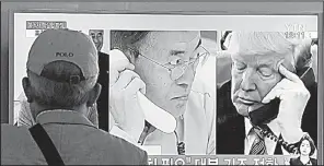  ?? AP/AHN YOUNG-JOON ?? A television in the railway station in Seoul shows South Korean President Moon Jae-in and U.S. President Donald Trump, who in a phone call Monday agreed to pressure North Korea as much as possible.