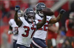  ?? JASON BEHNKEN - THE ASSOCIATED PRESS ?? Houston Texans strong safety Jahleel Addae (37) celebrates with cornerback Gareon Conley (22) after Addae intercepte­d a pass by Tampa Bay Buccaneers quarterbac­k Jameis Winston during the second half of a Saturday, Dec. 21, 2019, in Tampa, Fla.