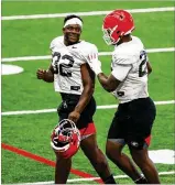  ?? TONY WALSH / UGA ?? Because he has had a personal experience with the issues of the day — with the death of his cousin — UGA linebacker Monty Rice (left) is perhaps one of the most vocal players on social justice.