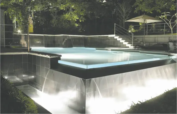  ?? PHOTO COURTESY OF BETZ POOLS ?? Located in Toronto’s Rosedale neighbourh­ood, this 20x36-foot pool was built into a steep hillside.