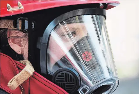 ?? SHAWNA COULTER SPECIAL TO THE EXAMINER ?? Katherine (Katie) Ross won the 2019 3M Scott Firefighte­r Combat Challenge with the fastest women’s time in the world.