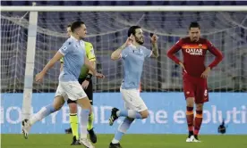  ?? Photograph: Andrew Medichini/AP ?? Luis Alberto (centre) celebrates after scoring Lazio’s third goal in the Rome derby.