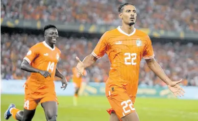  ?? AP ?? Sébastien Haller (right) of Cote d’Ivoire celebrates after scoring the winner against Nigeria in the Africa Cup of Nations final in Abidjan, Cote d’Ivoire yesterday.