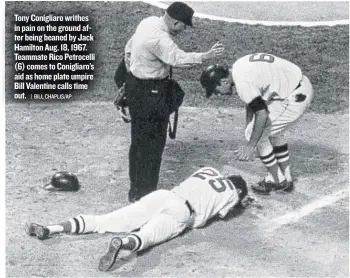  ?? | BILL CHAPLIS/ AP ?? Tony Conigliaro­writhes in pain on the ground after being beaned by Jack Hamilton Aug. 18, 1967. Teammate Rico Petrocelli ( 6) comes to Conigliaro’s aid as home plate umpire Bill Valentine calls time out.