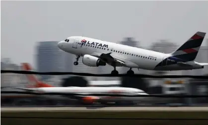  ?? Photograph: Nacho Doce/Reuters ?? A LATAM Airlines Brasil Airbus A319-100 plane takes off in São Paulo. A flight from Sydney to Auckland this week fell sharply, injuring passengers.