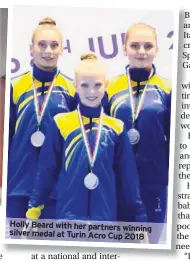  ??  ?? Holly Beard with her partners winning silver medal at Turin Acro Cup 2018