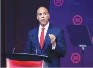  ?? AP PHOTO/DARRON CUMMINGS ?? Democratic presidenti­al candidate Corey booker speaks Thursday during the National Urban League Conference in Indianapol­is.