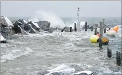  ??                                            ?? There’s a wharf in this picture – you just can’t see it. Port Lorne, like many Bay of Fundy communitie­s on Dec. 15, was inundated with higher than normal tides coming off a Dec. 14 full moon and waves pushed by winds off the bay. The wharf is a good...