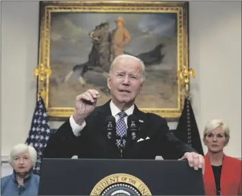  ?? AP PHOTO/ALEX BRANDON ?? President Joe Biden speaks about gas prices and oil companies profits, in the Roosevelt Room of the White House on Monday in Washington, as Treasury Secretary Janet Yellen (left) and Energy Secretary Jennifer Granholm (right) listen.