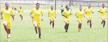  ?? (Pic: Melusi Mkhabela) ?? Young Buffaloes Ladies during their warm up session at Prince of Wales Sports Ground ahead of their fixture against Green Mamba, which they won 3-0.