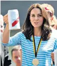  ??  ?? Ever profession­al: The Duchess navigated offers of alcohol with a smile, politely raising a glass for a toast at several engagement­s during the Royal couple’s tour of Poland and Germany in July