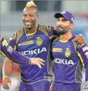  ?? AFP ?? Knight Riders captain Dinesh Karthik (right) has shown the way by emerging the highest scorer with 412 runs.