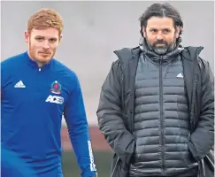  ??  ?? Fraser Fyvie alongside his Cove Rangers boss, Paul Hartley