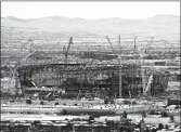  ?? JOHN LOCHER/AP ?? The Raiders’ new stadium in Las Vegas is among more than a dozen NFL venues in opportunit­y zones.