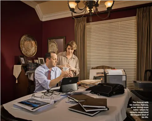  ??  ?? Tim Duncan with his mother, Patricia, at her dining room table—where he recently negotiated the biggest deal of his life.