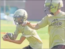  ?? JOHN HAEGER @ONEIDAPHOT­O ON TWITTER – ONEIDA DAILY DISPATCH ?? Canastota players work on a passing drill during practice on Tuesday.