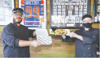  ??  ?? G.O.A.T. Tap and Eatery chefs Scott Rollins, left, and Duncan Haslam, continue to offer takeout options from the restaurant, including these lobster spring rolls which are part of the new menu.